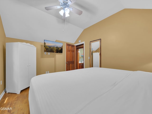 3541 Twin Pines Way, Sevierville, TN 37876 - bedroom with lofted ceiling, light wood-style flooring, baseboards, and a ceiling fan