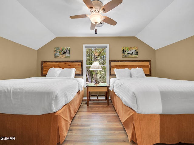 3541 Twin Pines Way, Sevierville, TN 37876 - bedroom with lofted ceiling, light wood-style flooring, and a ceiling fan