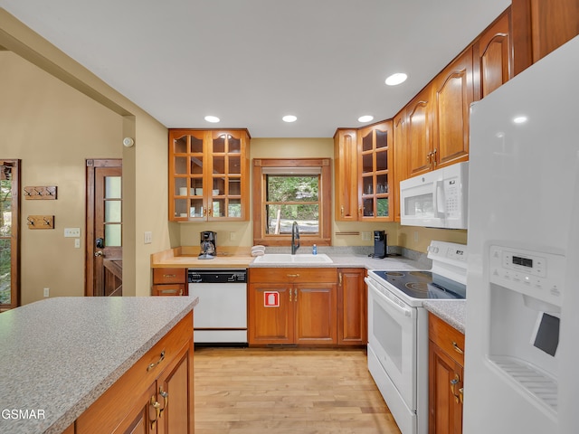 3541 Twin Pines Way, Sevierville, TN 37876 - kitchen with white appliances, a sink, light wood-style flooring, light countertops, and recessed lighting