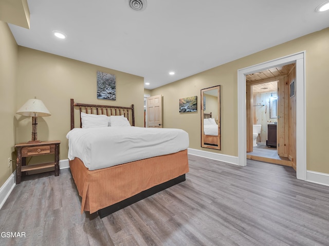 3541 Twin Pines Way, Sevierville, TN 37876 - bedroom featuring wood finished floors, baseboards, recessed lighting, and ensuite bath