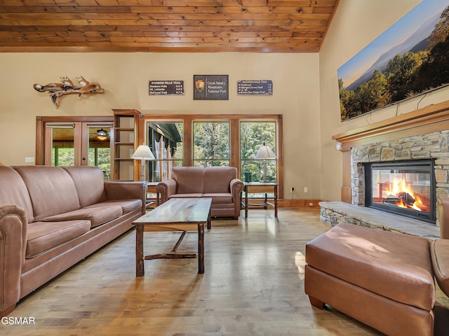 3541 Twin Pines Way, Sevierville, TN 37876 - living area with wooden ceiling, a fireplace, hardwood / wood-style flooring, high vaulted ceiling, and baseboards