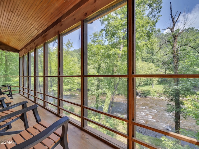 3541 Twin Pines Way, Sevierville, TN 37876 - sunroom / solarium with a water view, lofted ceiling, wood ceiling, and view of wooded area