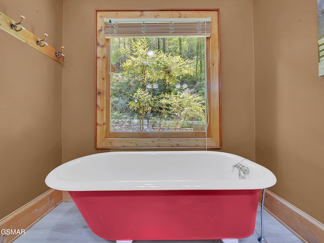 3541 Twin Pines Way, Sevierville, TN 37876 - bathroom with baseboards and a freestanding bath