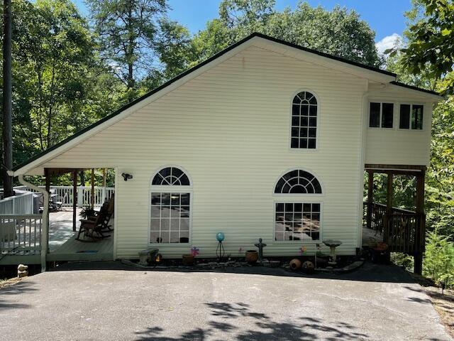 rear view of house with a deck