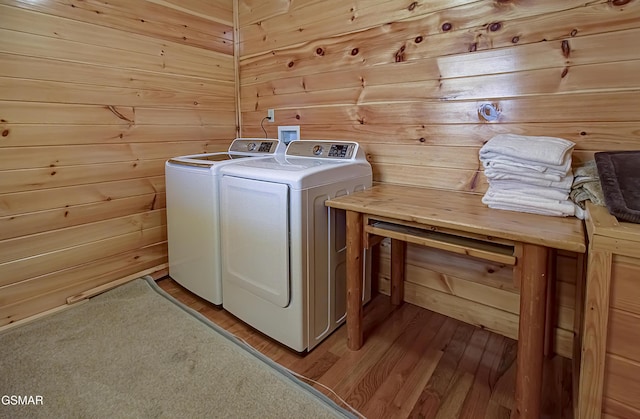2422 Majestic View Way, Sevierville, TN 37862 - laundry room with washer and clothes dryer, light wood finished floors, and wood walls