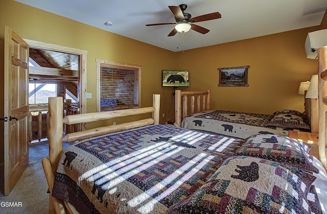 2422 Majestic View Way, Sevierville, TN 37862 - carpeted bedroom with a wall mounted AC, vaulted ceiling, and a ceiling fan