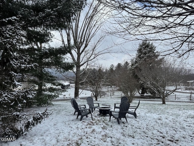 view of yard covered in snow