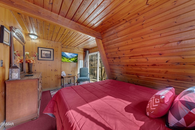 carpeted bedroom with baseboards, beamed ceiling, wood walls, wooden ceiling, and access to outside
