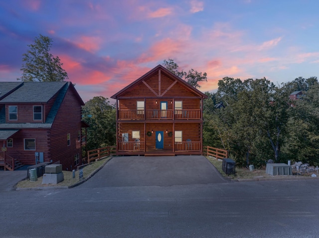 log home with a balcony