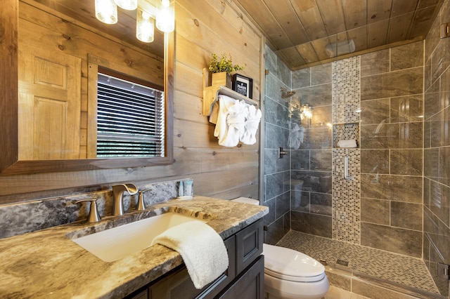 bathroom with vanity, wood walls, wood ceiling, and walk in shower