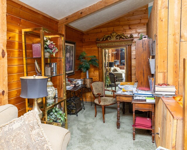 office with vaulted ceiling with beams, wood walls, and carpet