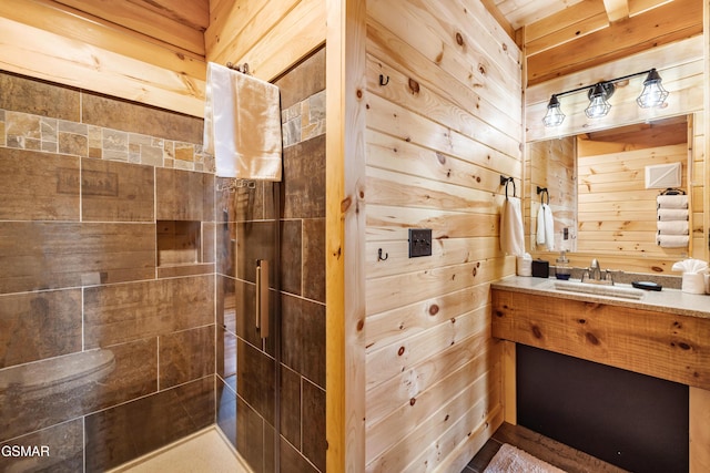 1890 Natures Ln, Sevierville, TN 37862 - full bath with wooden walls, vanity, and tiled shower