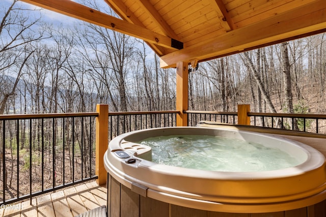 deck with a hot tub