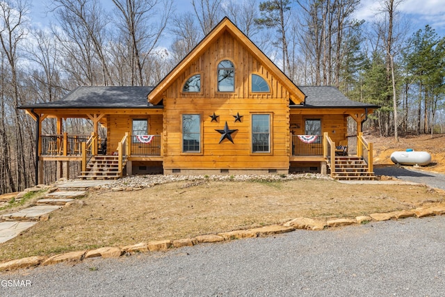 view of front of house with crawl space, roof with shingles, stairs, and covered porch