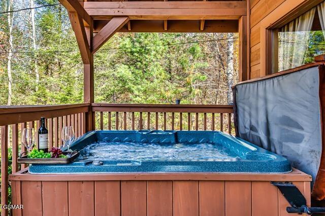 deck with a hot tub