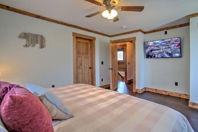 bedroom with ceiling fan, dark wood-type flooring, and ornamental molding