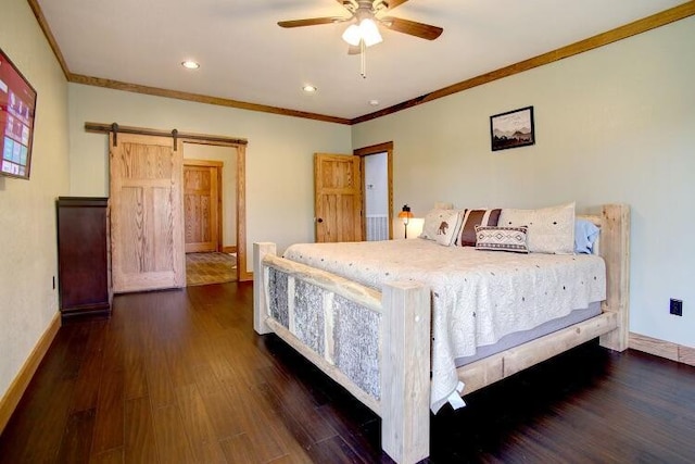 bedroom with a barn door, ceiling fan, crown molding, and dark wood-type flooring