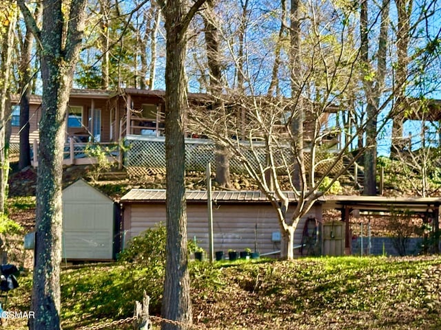 view of property exterior featuring a shed