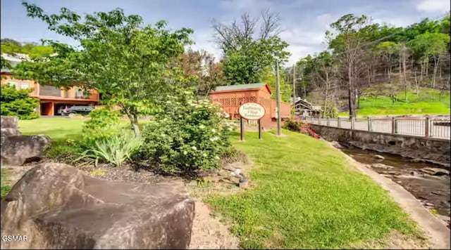 view of yard with fence