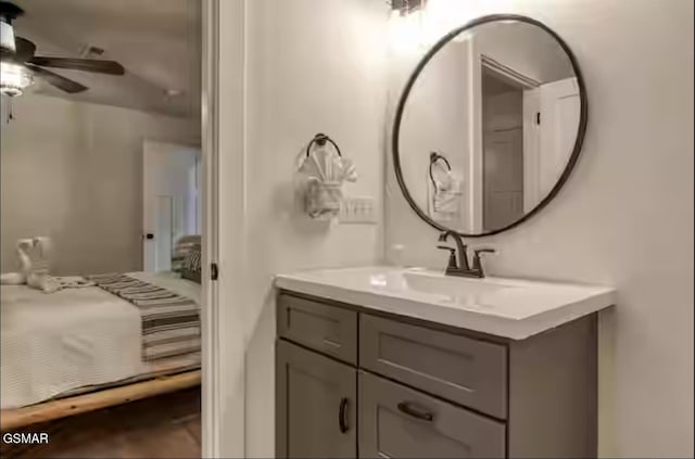 bathroom featuring ceiling fan and vanity