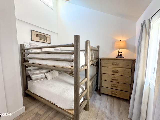 bedroom featuring light wood-style flooring