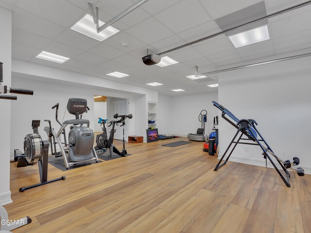 498 Proffitt Ridge Rd, Mooresburg, TN 37811 - exercise area featuring light wood-style floors and a paneled ceiling