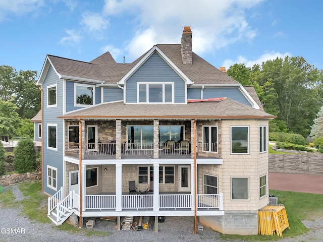 498 Proffitt Ridge Rd, Mooresburg, TN 37811 - back of property featuring a balcony, a chimney, a shingled roof, and a porch