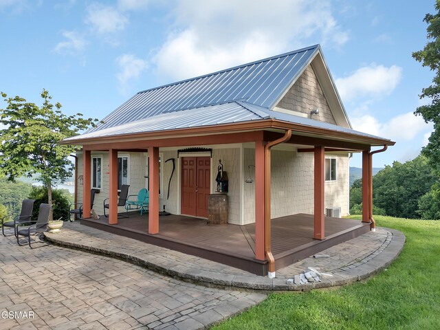 498 Proffitt Ridge Rd, Mooresburg, TN 37811 - back of house with a metal roof and covered porch