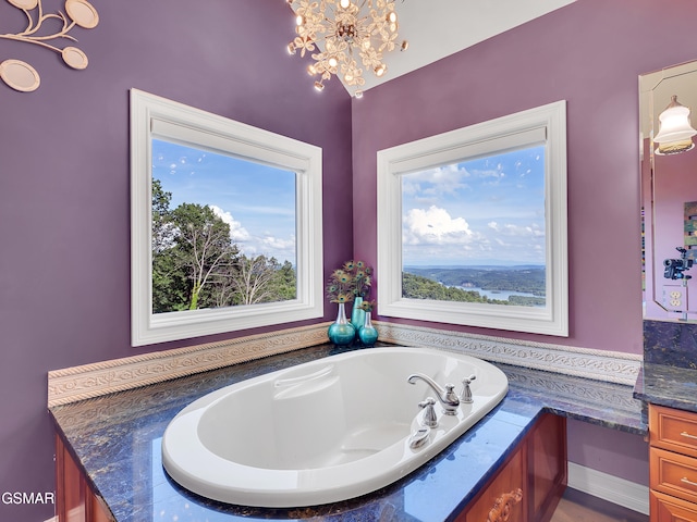 498 Proffitt Ridge Rd, Mooresburg, TN 37811 - full bath featuring a garden tub, a chandelier, and vanity
