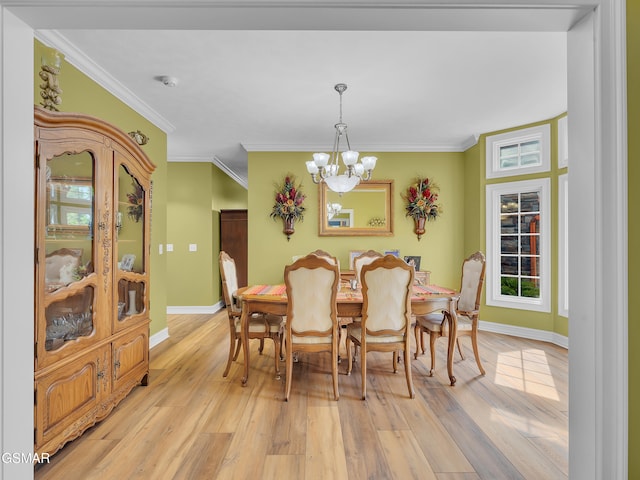 498 Proffitt Ridge Rd, Mooresburg, TN 37811 - dining space with a chandelier, light wood-style flooring, crown molding, and healthy amount of natural light