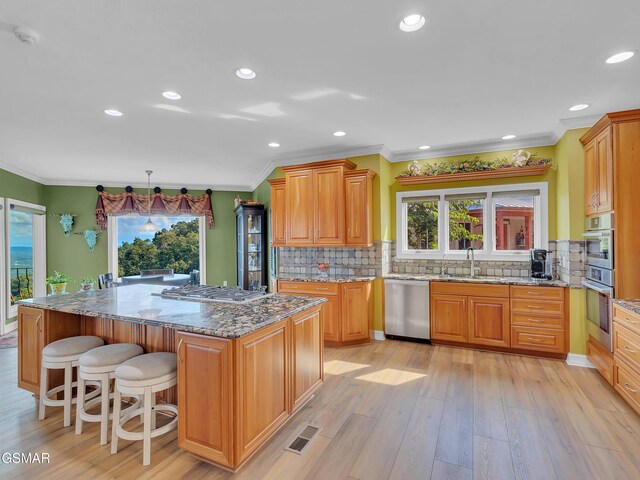 498 Proffitt Ridge Rd, Mooresburg, TN 37811 - kitchen with appliances with stainless steel finishes, stone counters, healthy amount of natural light, a kitchen island, and recessed lighting
