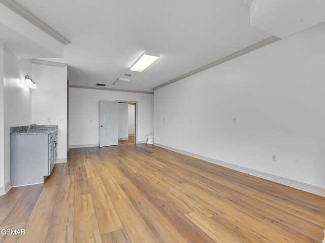 498 Proffitt Ridge Rd, Mooresburg, TN 37811 - spare room featuring crown molding and light wood-type flooring
