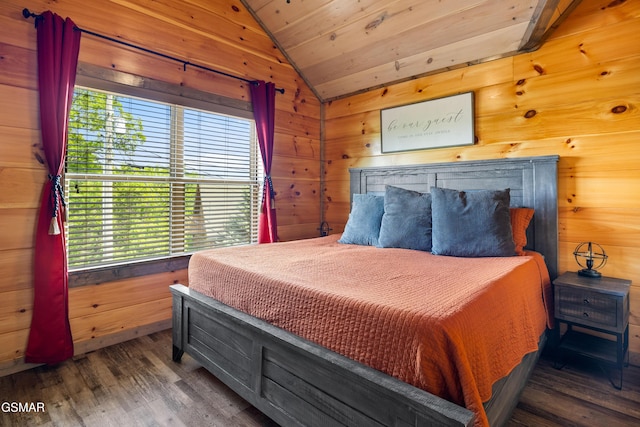 bedroom featuring multiple windows, vaulted ceiling, wood finished floors, wooden walls, and wood ceiling