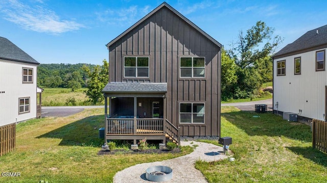 1105 Center St # 2, Sevierville, TN 37862 - view of front of property featuring board and batten siding and a front yard