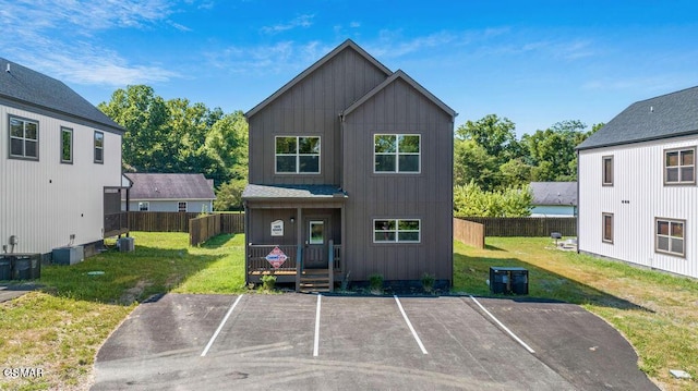 1105 Center St # 2, Sevierville, TN 37862 - modern inspired farmhouse with board and batten siding, uncovered parking, and a patio