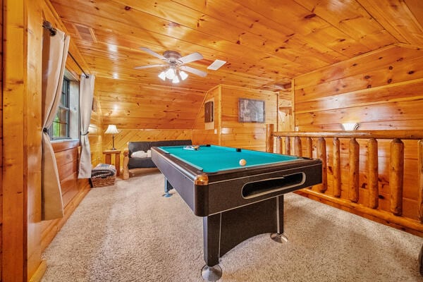 playroom with wood walls, light colored carpet, wood ceiling, and billiards