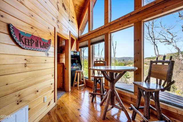 sunroom / solarium with wood ceiling