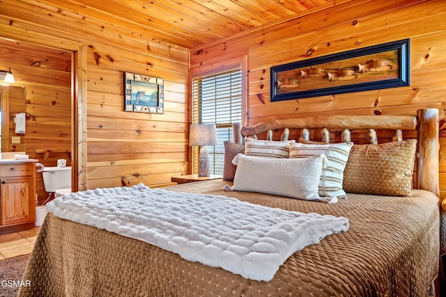 bedroom featuring wood ceiling, wood walls, and light tile patterned floors