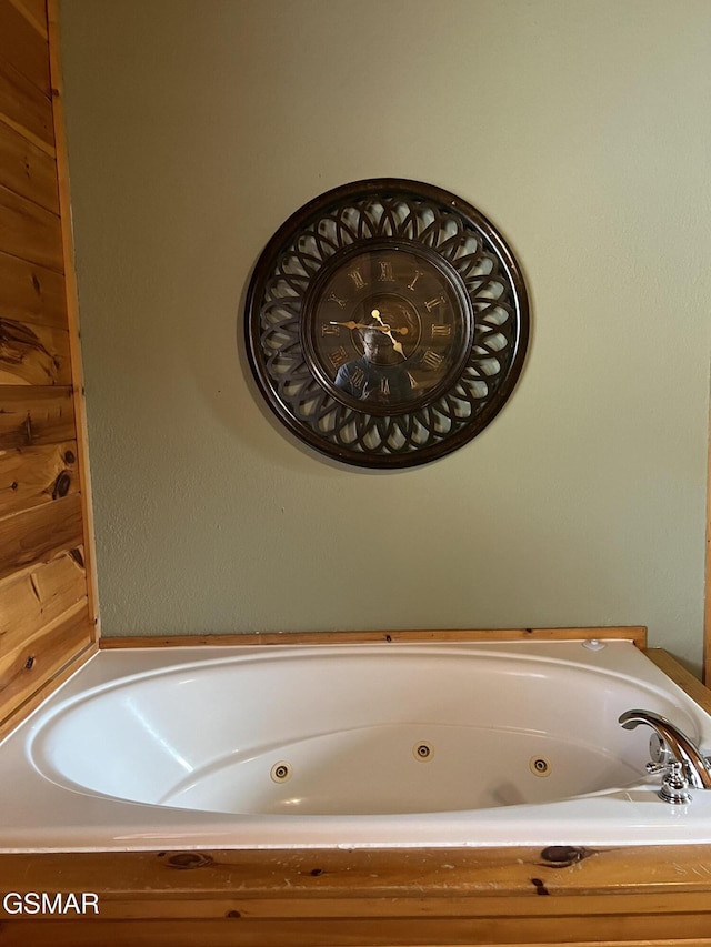full bath with a jetted tub