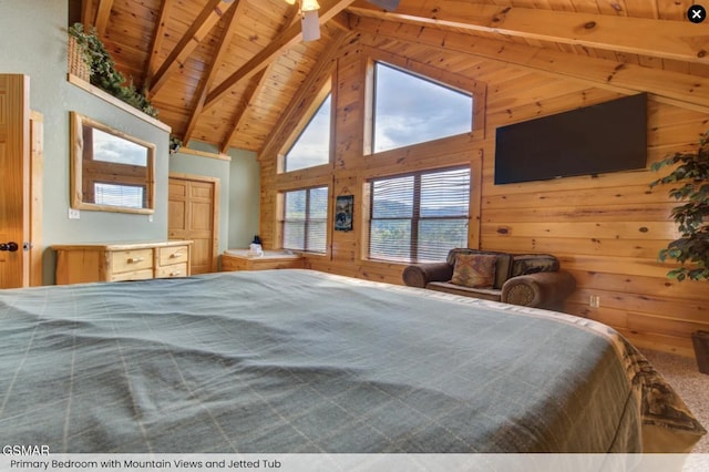 bedroom with beamed ceiling, wooden walls, high vaulted ceiling, and wooden ceiling