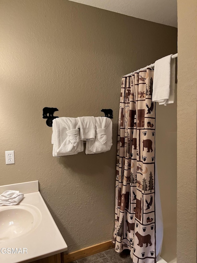 bathroom with a shower with curtain