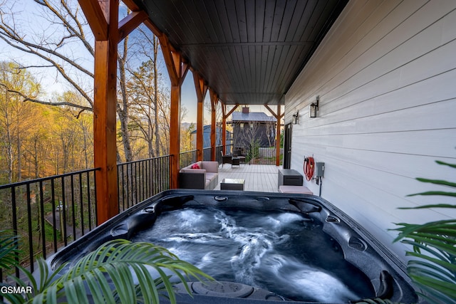 1040 Old Cartertown Rd, Gatlinburg, TN 37738 - view of patio with a hot tub and a deck