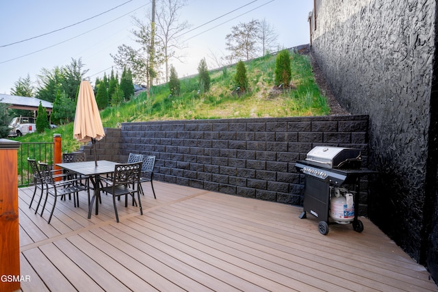 1040 Old Cartertown Rd, Gatlinburg, TN 37738 - deck featuring area for grilling and outdoor dining space