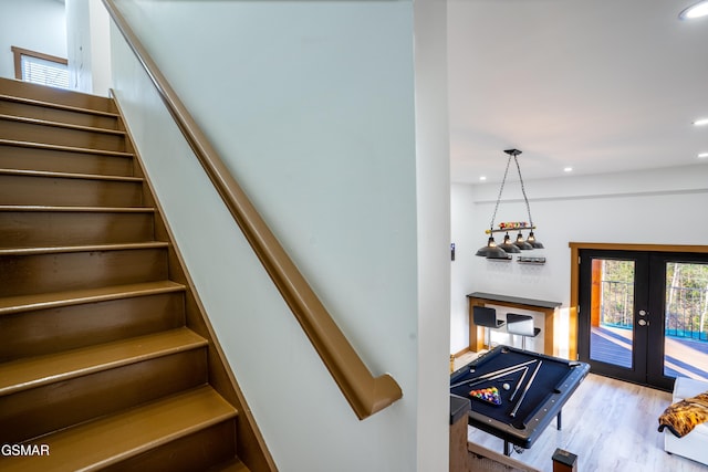 1040 Old Cartertown Rd, Gatlinburg, TN 37738 - staircase with french doors, wood finished floors, and recessed lighting
