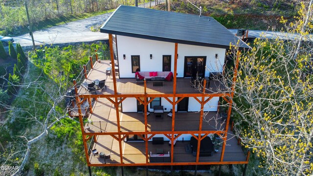 1040 Old Cartertown Rd, Gatlinburg, TN 37738 - view of side of property with a standing seam roof, a mountain view, metal roof, and a view of trees