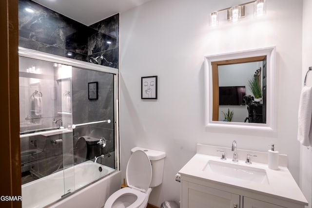 1040 Old Cartertown Rd, Gatlinburg, TN 37738 - full bathroom featuring toilet, vanity, and enclosed tub / shower combo