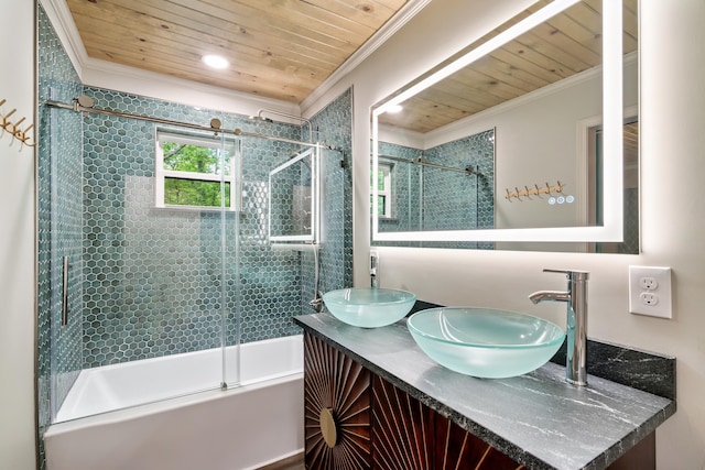 full bathroom featuring wood ceiling, crown molding, and a sink