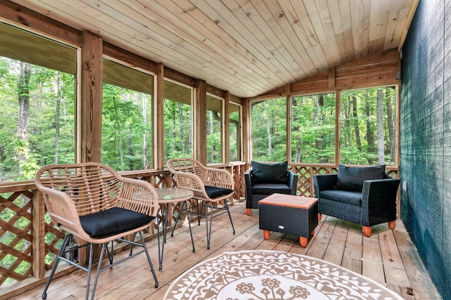 sunroom with lofted ceiling and wooden ceiling