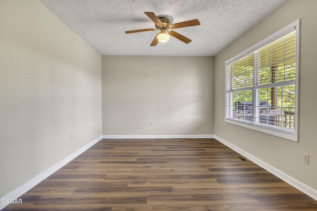 336 Perry Branch Way, Sevierville, TN 37876 - empty room with a textured ceiling, ceiling fan, dark wood finished floors, and baseboards