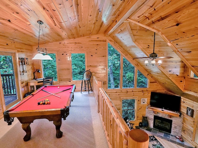 game room with lofted ceiling with beams, wood ceiling, a fireplace, and pool table